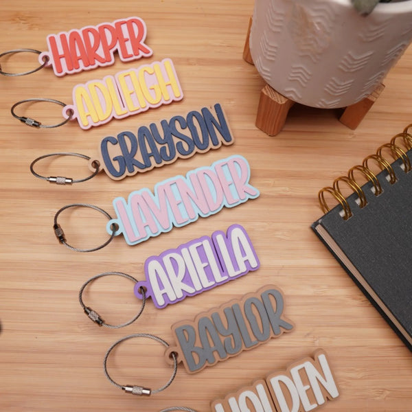 Tumbler name tags in many color pairs on wood: Harper, Grayson, Ariella and more