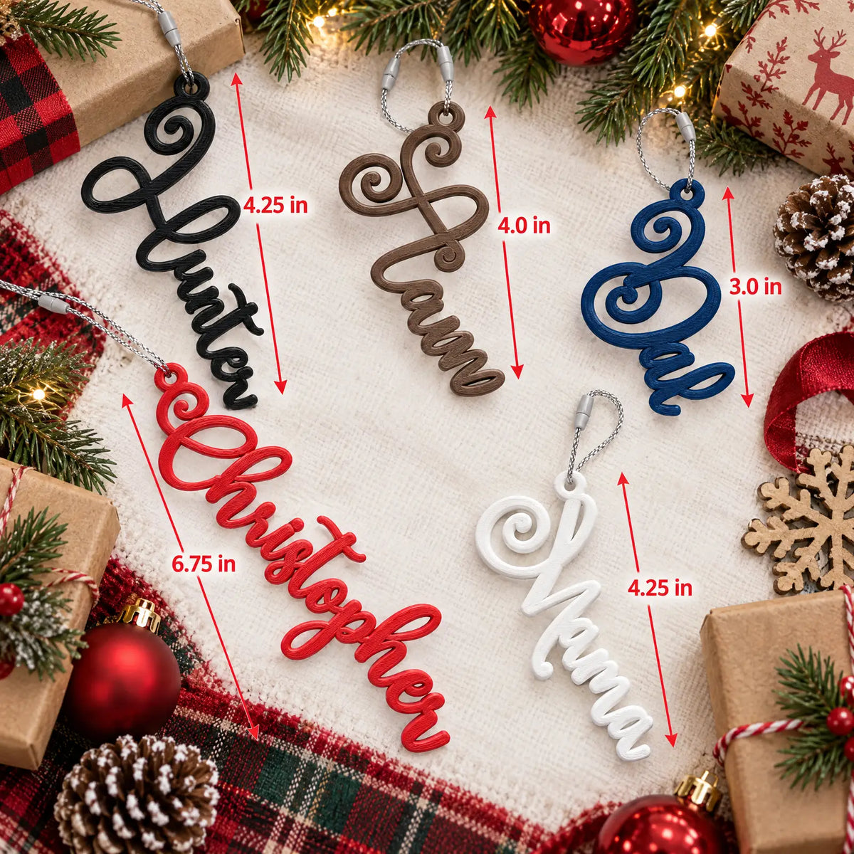 Flat lay of Elegant Script stocking name tags with ornaments, showing how tag length changes with each name