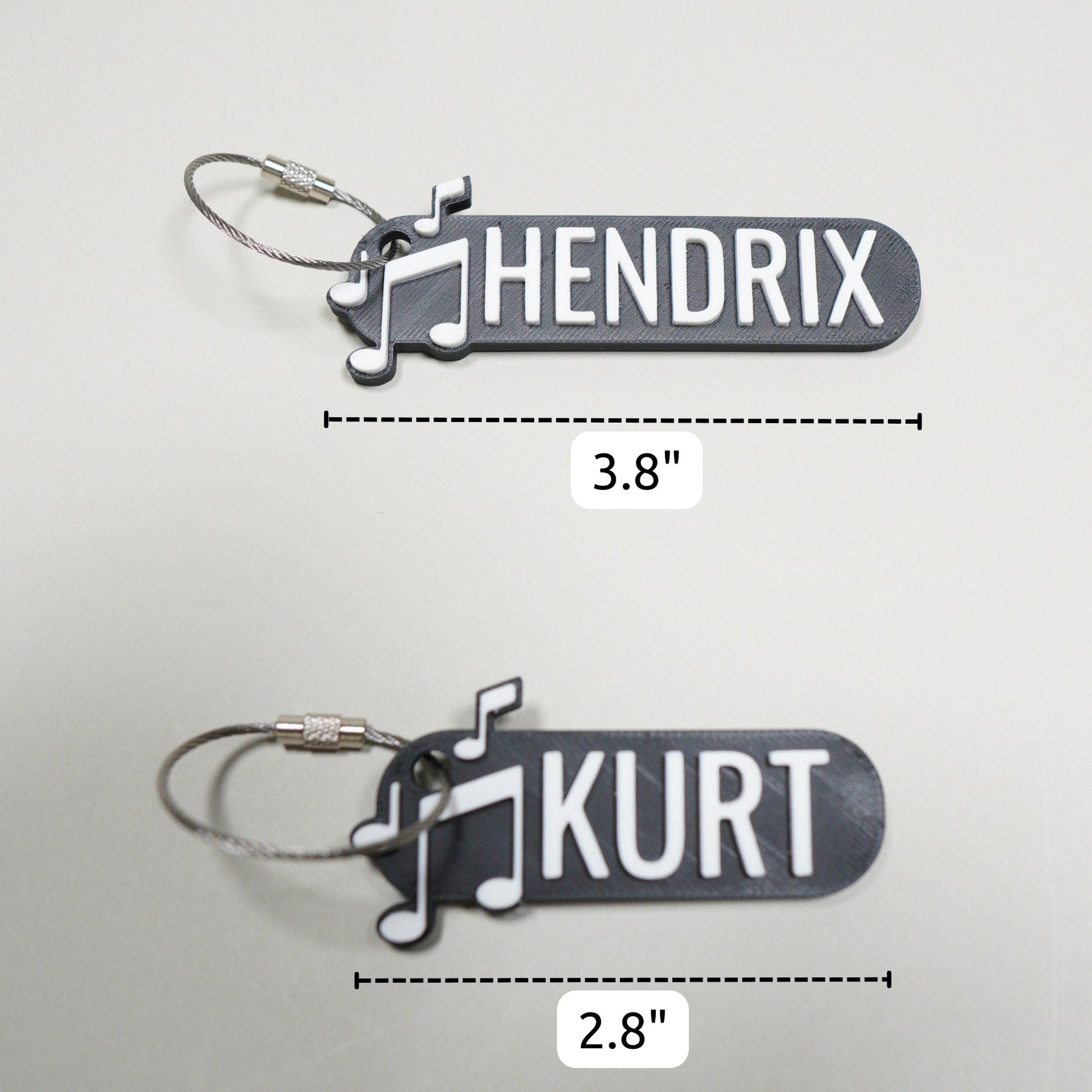 Personalized band keychain with music notes and custom name — photo 3