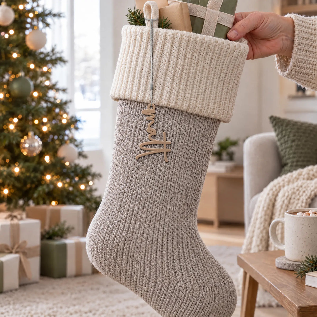 Lowercase Script Christmas Stocking Name Tag hanging on a Christmas stocking on Christmas morning